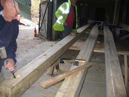 Roy cutting a mortise in the first whip
