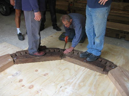 Using a handsaw to cut down between the joins