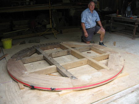 Two original and two new clasp arms let into felloes