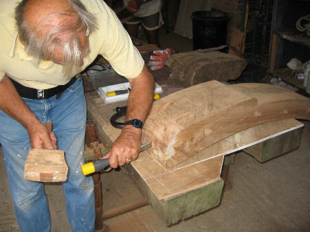 Gordon cutting a recess in one end of the brakeshoe