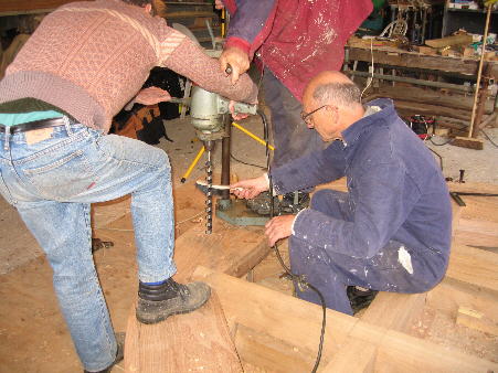 A pilot hole was drilled to start the mortise for each tooth. Drill stand set up square and drilled about 4 inches in and then finished with drill held by hand.