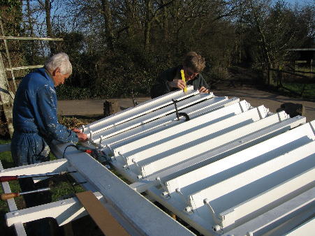 Gerry and Keith fitting shutters