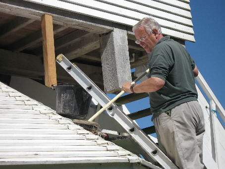 John cleaning the roundhouse roof