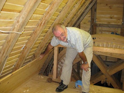 Craig fitting sides to grain bin