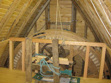 Sack hoist drive. New wooden teeth to be made on the edge of the iron wheel to engage with brakewheel teeth