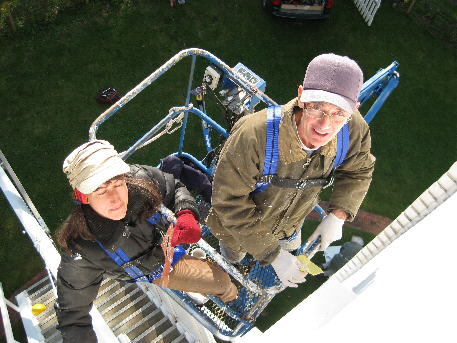 Mick and Ruth painting from cherry picker