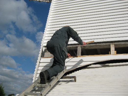 Fitting weather boarding to skirt
