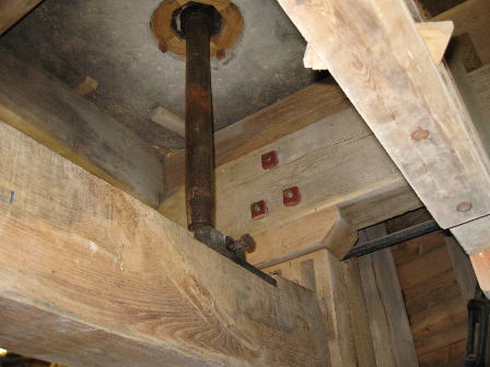 Shaft supporting runner stone on bridge tree